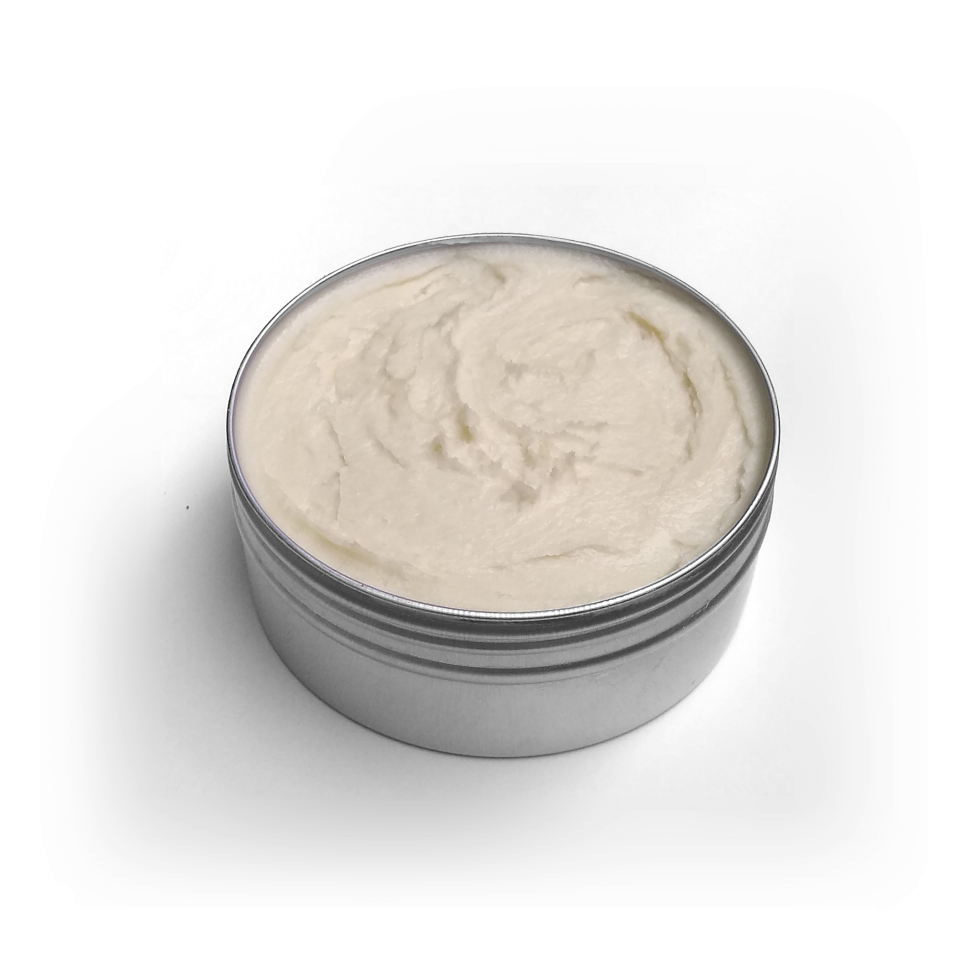 Whipped shea butter in open tin